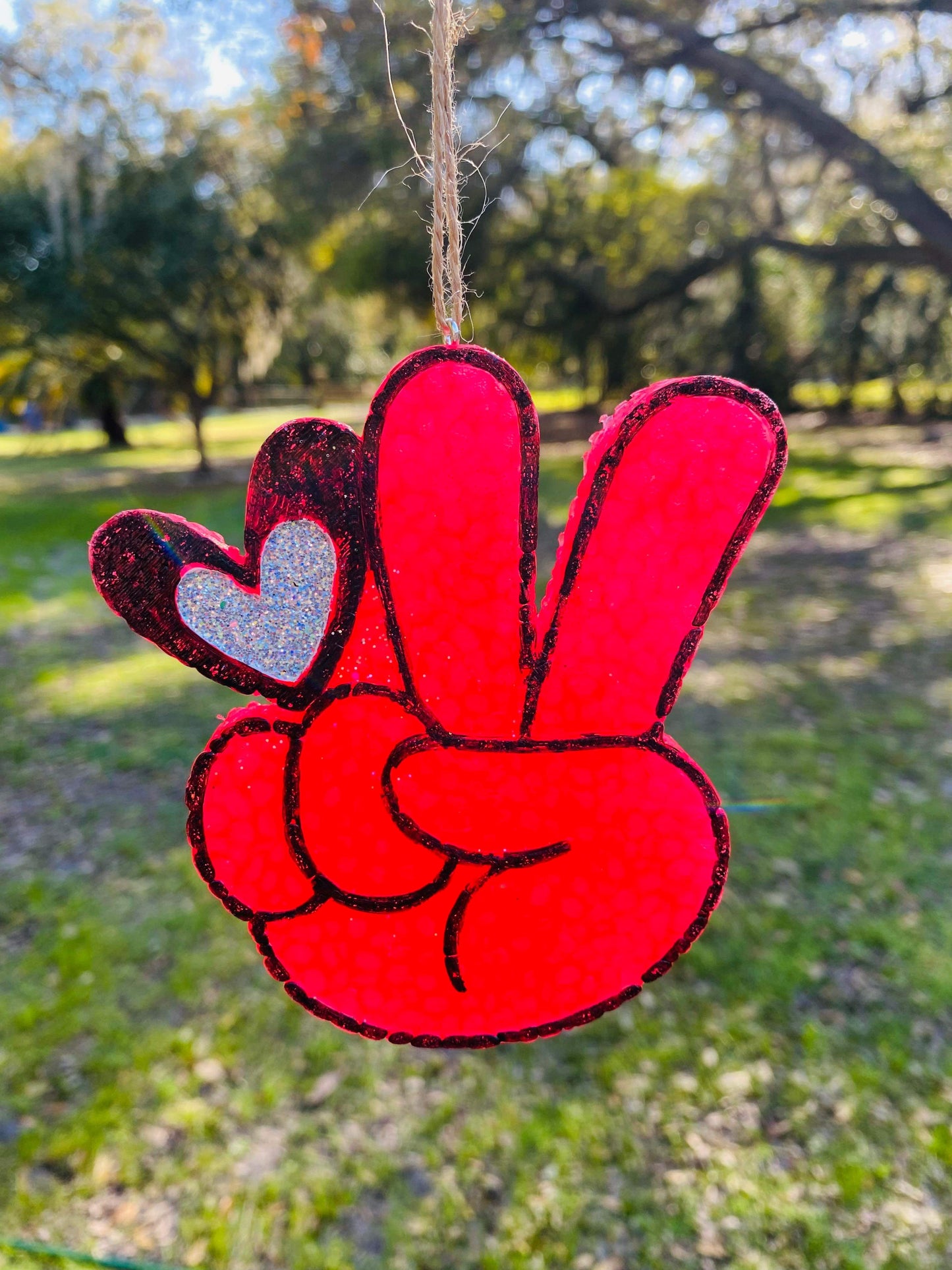 Coral peace finger