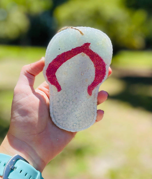 White and pink flip flop