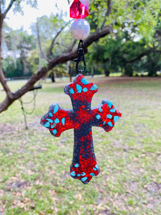 Red and turquoise cross