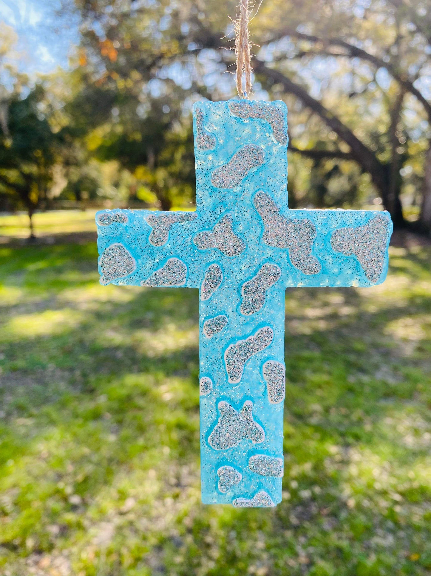 Turquoise cowprint cross